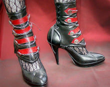 Black leather military style spats with red appliqué and button detail